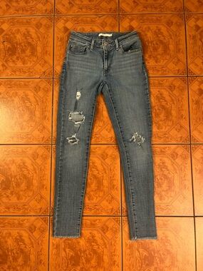 Levi's Women's Distressed Mid Blue Skinny Jeans